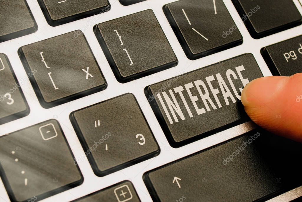 Handwriting text writing Interface. Concept meaning point of meeting and communicating between two structures Pc keyboard key with pointing finger above background copy space.