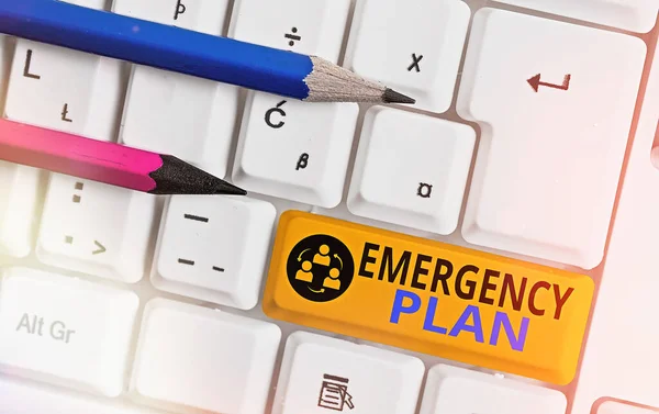 Conceptual hand writing showing Emergency Plan. Business photo text actions to be conducted in a certain order or manner Colored keyboard key with accessories arranged on empty copy space. — Stock Photo, Image