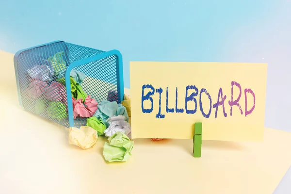 Handwriting text writing Billboard. Concept meaning a wide outdoor board for displaying normally on the side of a road Trash bin crumpled paper clothespin empty reminder office supplies tipped.