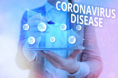 Coronavirus hastalığını gösteren kavramsal el yazısı. İş fotoğrafı metni, yeni bir virüs olan SARSCoV2 Ok sembolünün yol açtığı hastalık olarak tanımlanıyor..