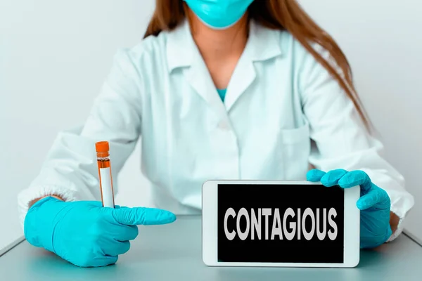 Writing note showing Contagious. Business photo showcasing transmissible by direct or indirect contact with infected an individual Laboratory blood test sample for medical diagnostic analysis. — Stock Photo, Image