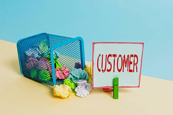 Word writing text Customer. Business concept for individual or company buying from a store either goods or services Trash bin crumpled paper clothespin empty reminder office supplies tipped. — Stock Photo, Image