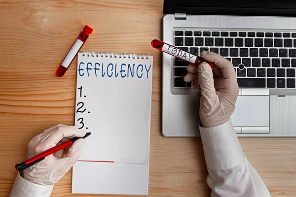 Ecriture conceptuelle montrant l'efficacité. Business photo texte capacité à prévenir un gaspillage de ressources argent de l'énergie et le temps Flacon de sang dernière technologie prête pour l'examen. — Photo