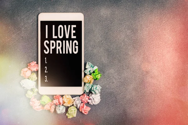 Text sign showing I Love Spring. Conceptual photo telling why having a strong affection to this season Paper accesories with digital smartphone arranged on different background.