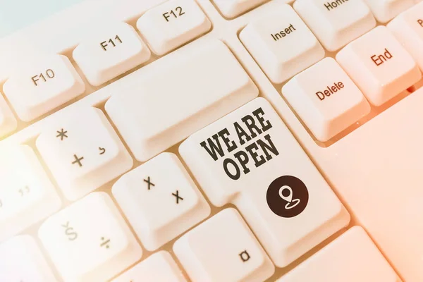 Text sign showing We Are Open. Conceptual photo no enclosing or confining barrier, accessible on all sides Pc keyboard key with empty note paper above background copy space. — Stock Photo, Image