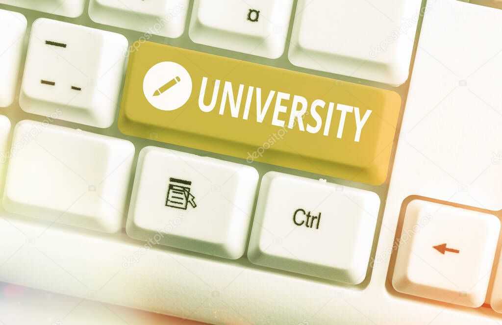 Word writing text University. Business concept for an educational institution designed to teach and investigate Different colored keyboard key with accessories arranged on empty copy space.