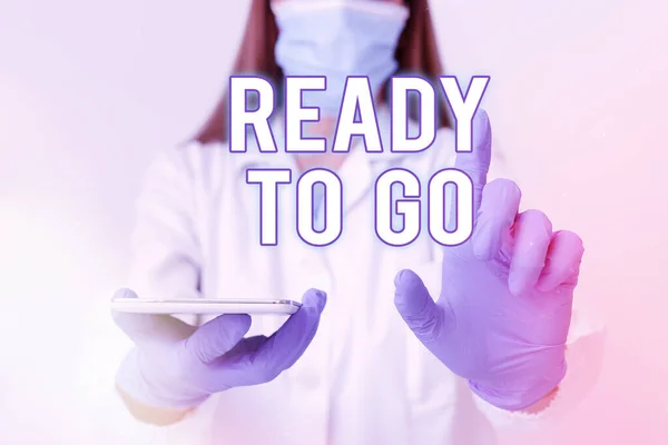 Conceptual hand writing showing Ready To Go. Business photo showcasing prepared and suitable to move or to travel to another place Laboratory technician featuring paper accessories smartphone.