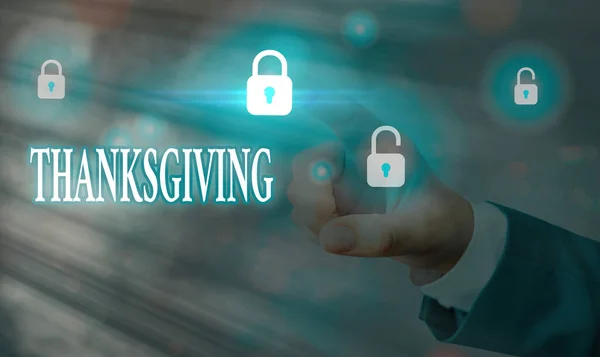 Handwriting text writing Thanksgiving. Concept meaning grateful recognition of benefits favors particularly of God Graphics padlock for web data information security application system.