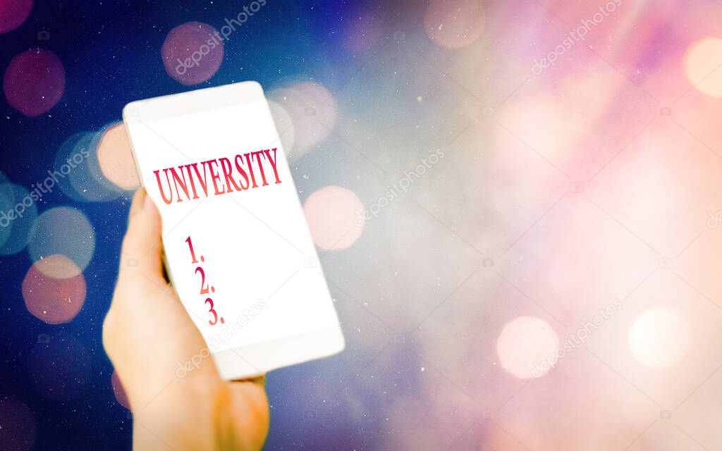 Conceptual hand writing showing University. Business photo showcasing an educational institution designed to teach and investigate Modern gadgets white screen under colorful bokeh background.