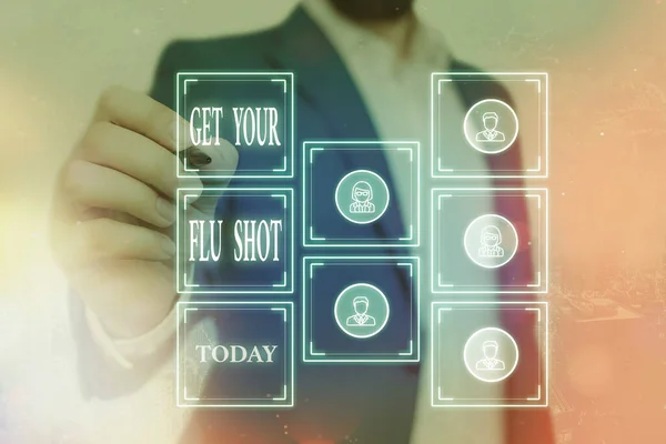 Psaní poznámky s názvem Get Your Flu Shot. Podnikové fotografie předvádění imunizace je uveden každoročně na ochranu proti chřipce mřížky a různé ikony nejnovější digitální technologie koncept. — Stock fotografie