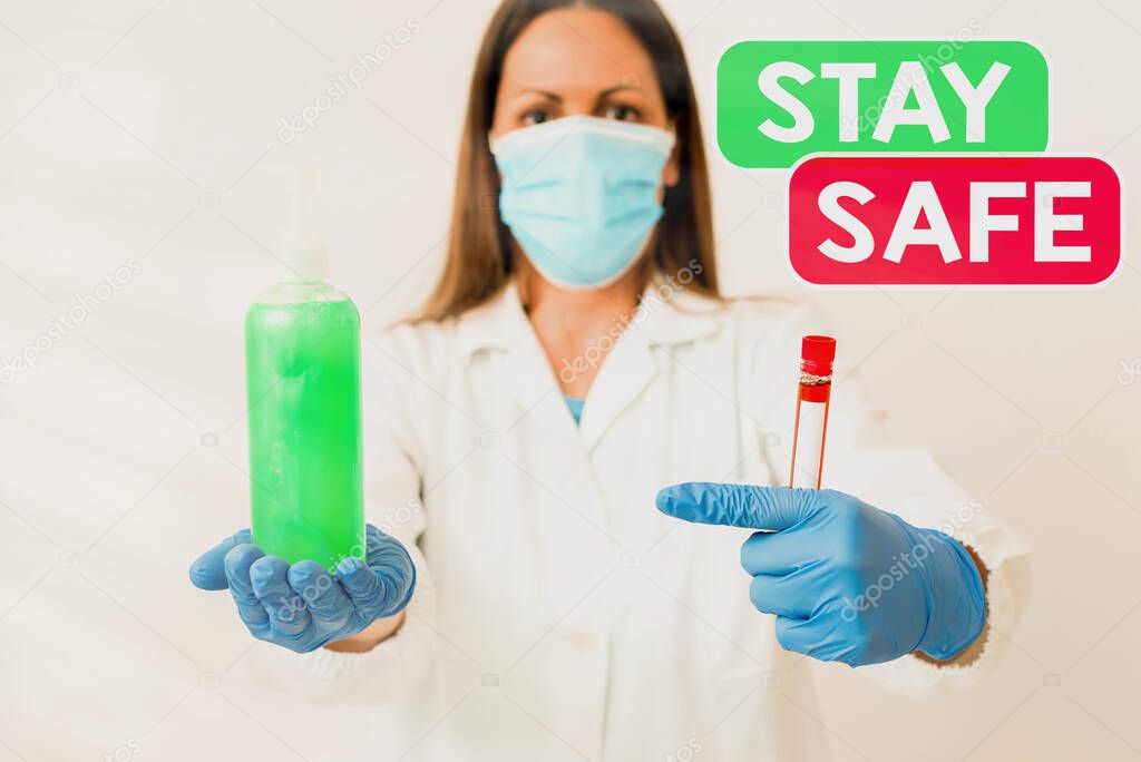 Conceptual hand writing showing Stay Safe. Business photo text secure from threat of danger, harm or place to keep articles Laboratory blood test sample for medical diagnostic analysis.