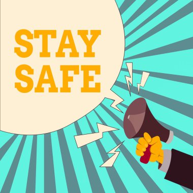 Stay Safe 'i gösteren bir not yazıyorum. İş fotoğrafı gösterimi tehlike, zarar ya da makaleleri saklamak için güvenli bir yer ya da yer Erkek Hu Analizi El Tutma Megafonu Boş Konuşma Balonu.
