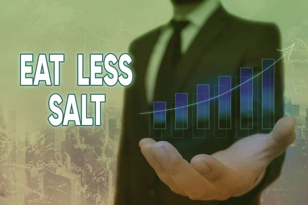 Conceptual hand writing showing Eat Less Salt. Business photo text reducing the sodium intake on the food and beverages Arrow symbol going upward showing significant achievement.