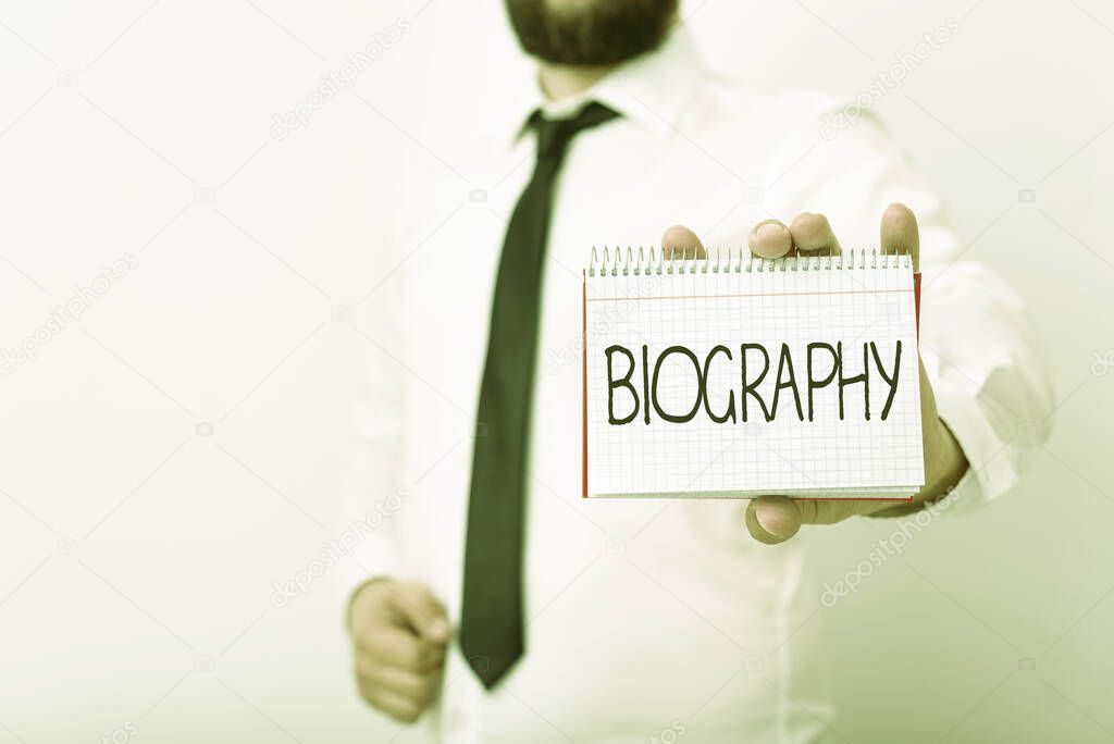 Handwriting text writing Biography. Concept meaning an account of the life of something such as an animal, a coin, etc. Model displaying different empty color notepad mock-up for writing idea.