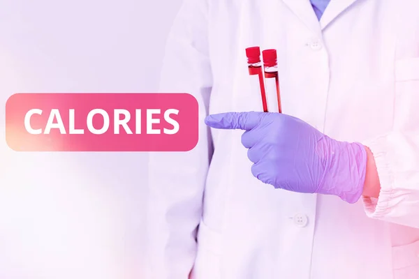 Écriture manuscrite de texte Calories. Concept s'entend d'une quantité d'aliment ayant une valeur énergétique d'un grand échantillon de sang de laboratoire de calories montré pour le résultat de l'analyse diagnostique médicale. — Photo