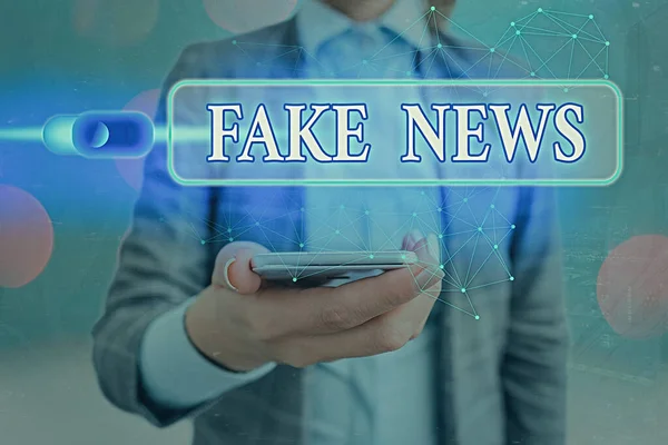 Text sign showing Fake News. Conceptual photo false information publish under the guise of being authentic news Graphics padlock for web data information security application system.