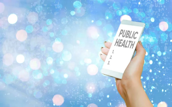 Text sign showing Public Health. Conceptual photo science of protecting and improving the health of a community Modern gadgets with white display screen under colorful bokeh background.
