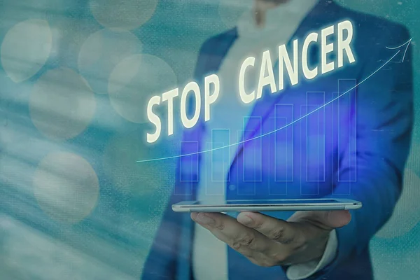 単語書き込みテキストがんを停止します。体内の異常な細胞の制御されていない成長を防止するためのビジネスの概念矢印記号は、大きな成果を示す上の点を示す. — ストック写真