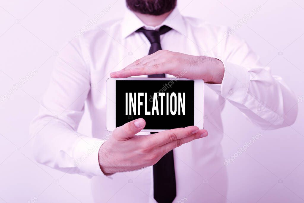 Writing note showing Inflation. Business photo showcasing increase in the volume of money relative to available goods Model displaying black screen modern smartphone mock-up.