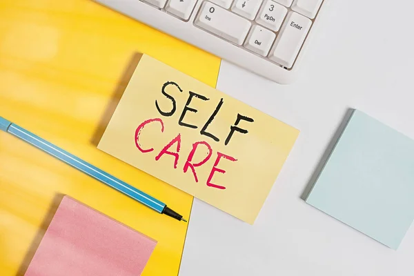 Word writing text Self Care. Business concept for the practice of taking action to preserve or improve one s is health Empty blank paper with copy space and pc keyboard above orange background table. — Stock Photo, Image