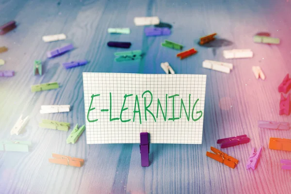 Conceptual hand writing showing E Learning. Business photo text knowledge we obtain through the internet using electronic device Colored crumpled rectangle shape paper light blue background. — Stock Photo, Image
