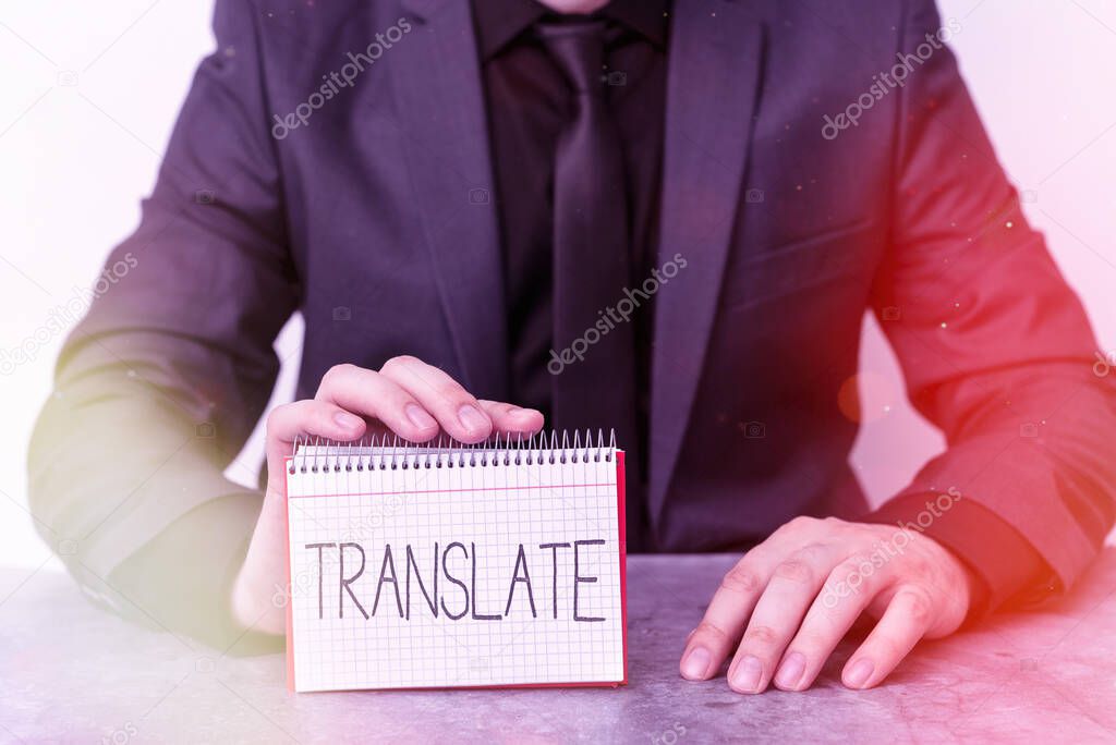Conceptual hand writing showing Translate. Business photo text bear, remove, or change from one place, state, form, or appearance Model displaying different color notepad mock-up for writing idea.