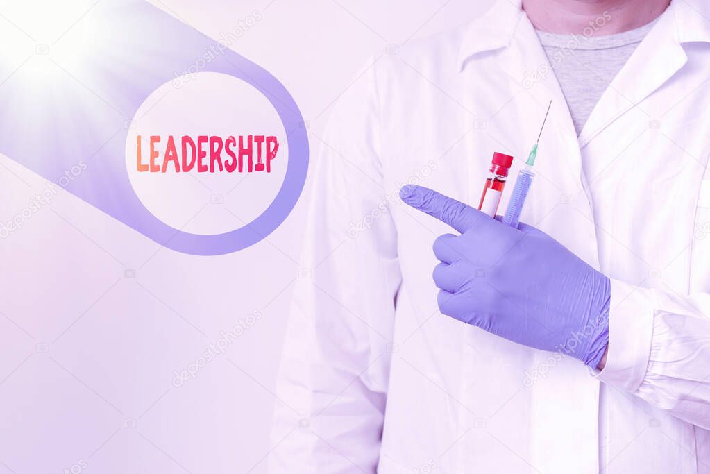 Text sign showing Leadership. Conceptual photo ability to guide others without force into direction or decision Displaying Empty Sticker Paper Accessories Smartphone With Medical Gloves On.