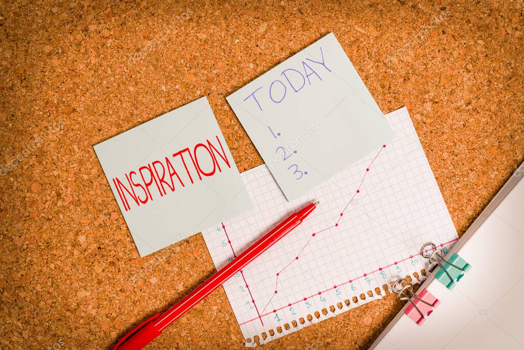 Conceptual hand writing showing Inspiration. Business photo text the process of being mentally stimulated to do or feel something Desk notebook paper office paperboard study supplies chart.
