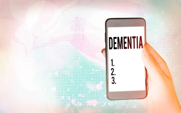 Word writing text Dementia. Business concept for usually, a progressive condition marked by multiple deficits Modern gadgets with white display screen under colorful bokeh background. — Stock Photo, Image