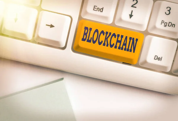 Text sign showing Blockchain. Conceptual photo digital database containing information that can be used Different colored keyboard key with accessories arranged on empty copy space. — Stock Photo, Image