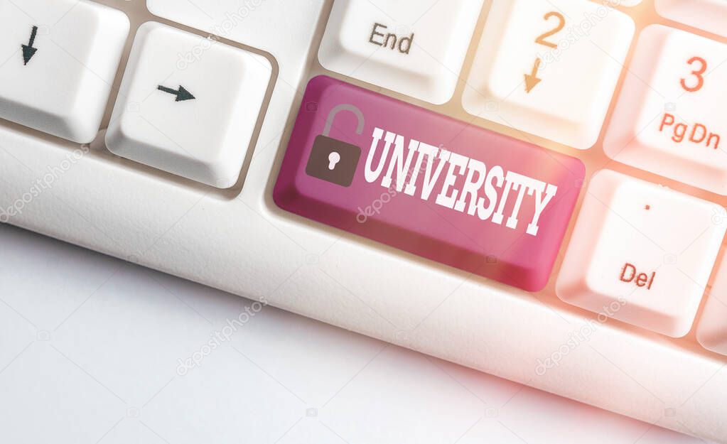 Word writing text University. Business concept for institution of higher learning providing facilities for teaching Different colored keyboard key with accessories arranged on empty copy space.