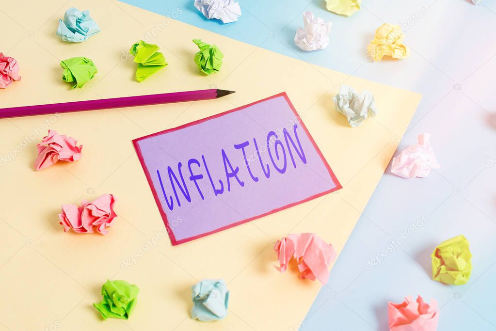 Conceptual hand writing showing Inflation. Business photo text increase in the volume of money relative to available goods Colored crumpled papers empty reminder blue yellow clothespin.