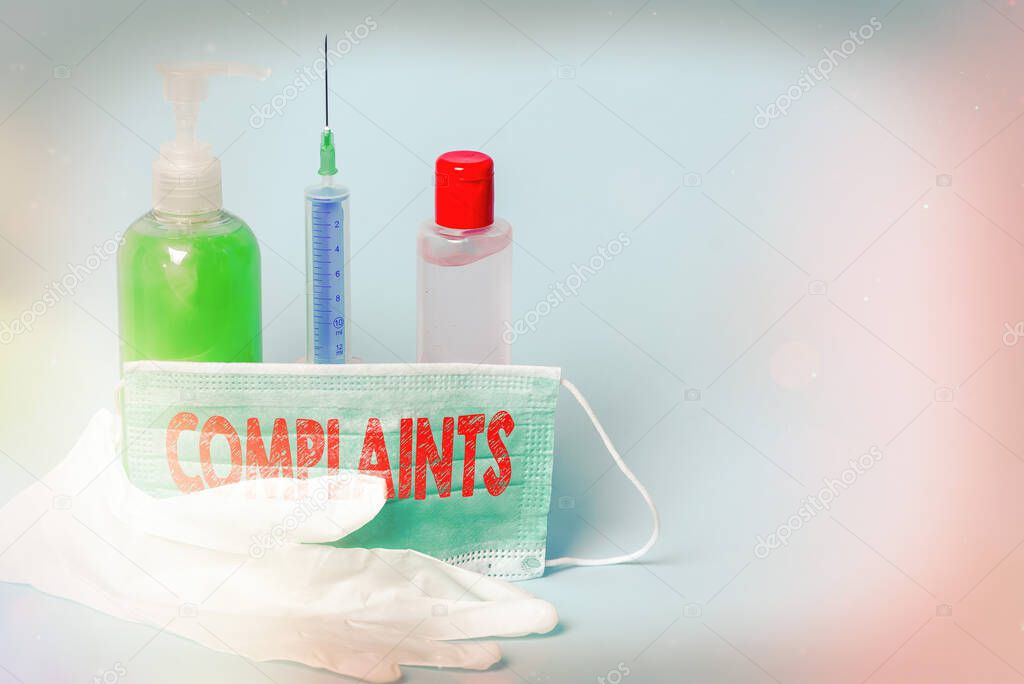 Handwriting text writing Complaints. Concept meaning something that is the cause or subject of protest or outcry Primary medical precautionary equipments for health care protection.