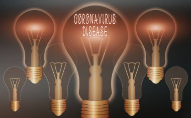 Coronavirus hastalığını gösteren kavramsal el yazısı. Yeni bir virüs olan SARSCoV2 'nin yol açtığı hastalık olarak tanımlanan iş fotoğrafı sergisi renkli renkli ampuller, fikir işareti çözümü.