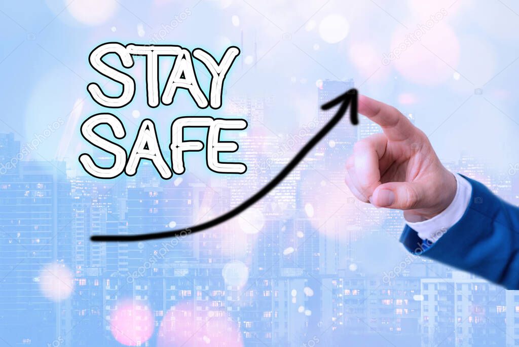 Text sign showing Stay Safe. Conceptual photo secure from threat of danger, harm or place to keep articles digital arrowhead curve rising upward denoting growth development concept.