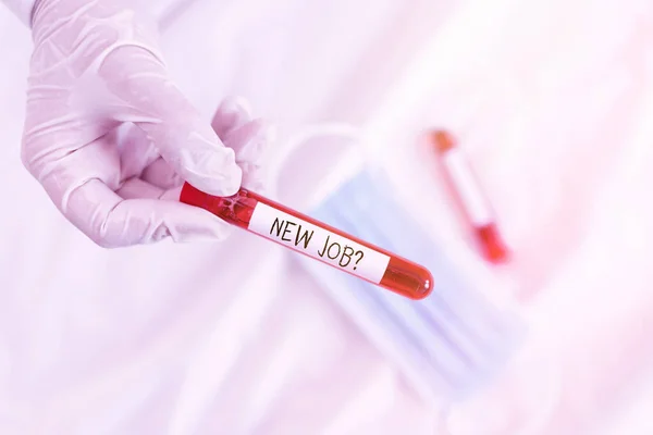 Text sign showing New Job Question. Conceptual photo asking if an individual got regular work to earn money Extracted blood sample vial ready for medical diagnostic examination. — Stock Photo, Image