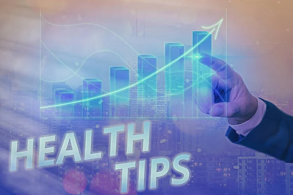 Writing note showing Health Tips. Business photo showcasing advice or information given to be helpful in being healthy Arrow symbol going upward showing significant achievement.