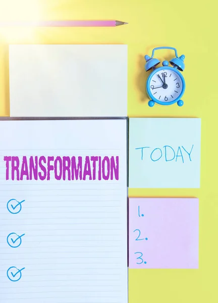 Text sign showing Transformation. Conceptual photo process, or instance of transforming or being transformed Colored empty papers with copy space on the yellow background table. — Stock Photo, Image