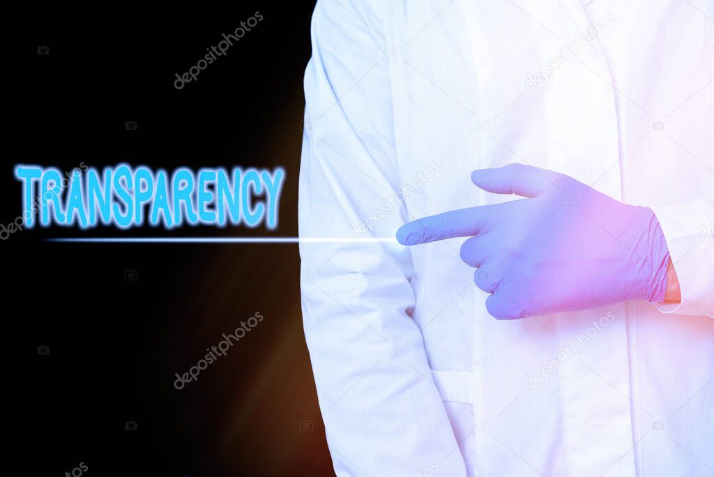 Conceptual hand writing showing Transparency. Business photo showcasing something transparent especially a picture viewed by light Displaying Sticker Paper Accessories With Medical Gloves On.