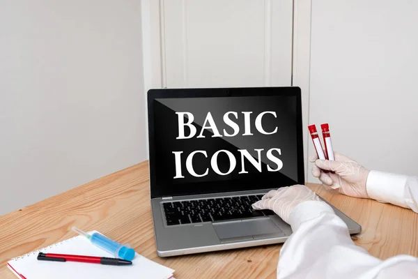 Writing note showing Basic Icons. Business photo showcasing pictogram or ideogram displayed on a computer screen or phone Blood sample vial lastest technology ready for examination. — Stock Photo, Image