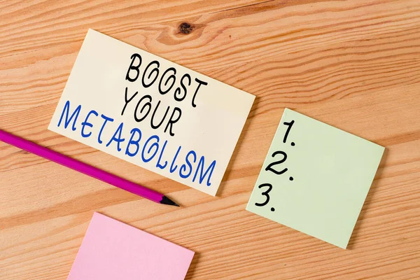 Signo de texto mostrando Boost Your Metabolism. Proceso corporal de foto conceptual utiliza para hacer y quemar energía de los alimentos Papeles de pinza de ropa de colores recordatorio vacío piso de madera oficina de fondo. — Foto de Stock