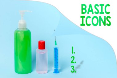 Temel Simgeleri gösteren not yazılıyor. Bir bilgisayar ekranında veya telefonda görüntülenen iş fotoğrafı veya ideogramı sağlık hizmetlerinin korunması için birincil tıbbi önlem ekipmanları.