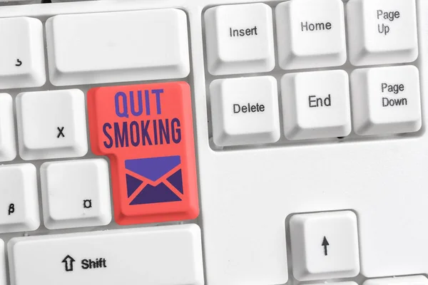 Handwriting text Quit Smoking. Concept meaning Discontinuing or stopping the use of tobacco addiction Different colored keyboard key with accessories arranged on empty copy space. — Stock Photo, Image