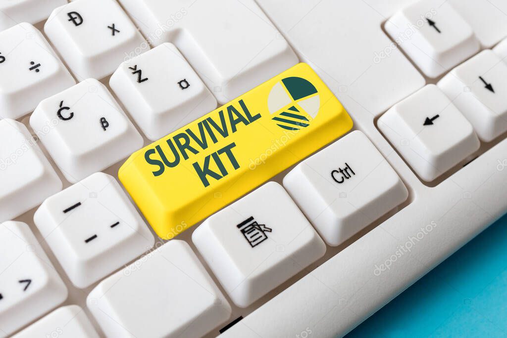 Conceptual hand writing showing Survival Kit. Business photo text Emergency Equipment Collection of items to help someone Colored PC keyboard key With Accessories on Empty background.