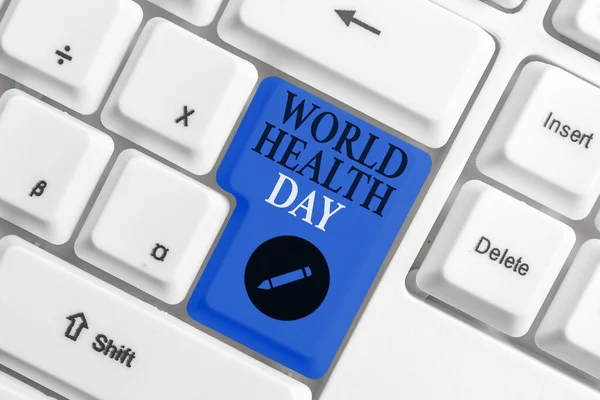 Handwriting text writing World Health Day. Concept meaning global health awareness day celebrated every year on 7 April Different colored keyboard key with accessories arranged on empty copy space.