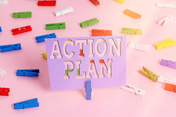 Handschriftliches Textschreiben Aktionsplan. Konzept, d.h. detaillierter Plan, der Maßnahmen skizziert, die erforderlich sind, um Ziele oder Visionen zu erreichen. — Stockfoto