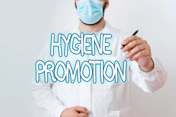 Notiz über Hygieneförderung. Business-Foto zeigt systematisches Programm zur Vorbeugung von Krankheiten mit Hygiene Labortechniker mit Aufkleber Papier Smartphone. — Stockfoto