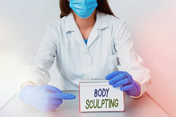 Text sign showing Body Sculpting. Conceptual photo activity of increasing the body s is visible muscle tone Laboratory technician featuring empty sticker paper accessories smartphone.