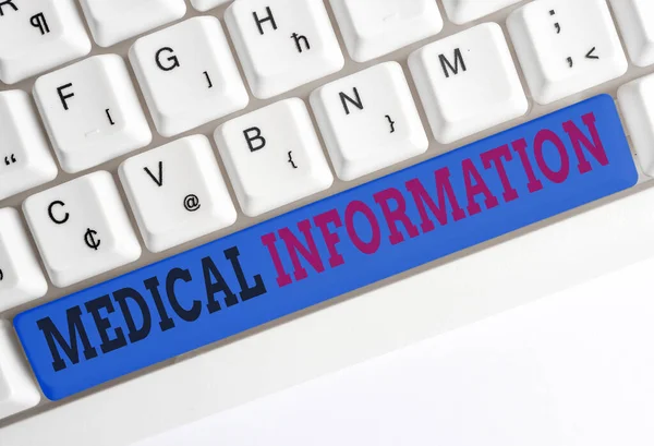 Handwriting text Medical Information. Concept meaning an individual demographic information and medical histories Different colored keyboard key with accessories arranged on empty copy space.