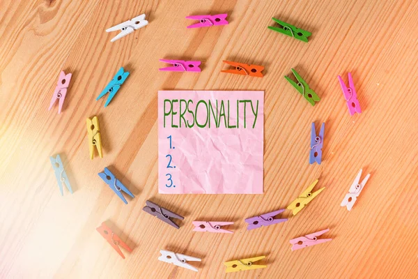 Conceptual hand writing showing Personality. Business photo text the condition or fact of relating to a particular an individual Colored crumpled papers wooden floor background clothespin. — Stock Photo, Image